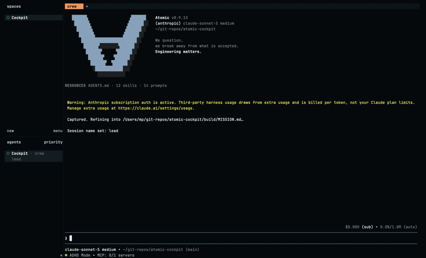 The same pane after Enter, filled by Atomic's start-up banner: version v0.9.13, provider anthropic, model claude-sonnet-5 medium, working directory ~/git-repos/atomic-cockpit. Below it a yellow warning that subscription usage is billed per token as extra usage, then the lines "Captured. Refining into /Users/mp/git-repos/atomic-cockpit/build/MISSION.md…" and "Session name set: lead". The input line under them is empty, and the tab bar still holds only the crew tab.